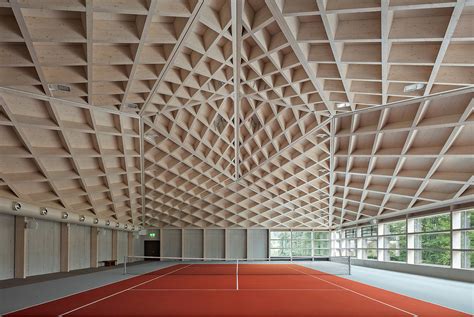 desymbol: Geometric timber roofs cover Diamond Domes tennis courts in Switzerland