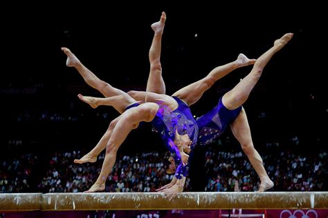 Multiple exposure of female gymnast on balance beam Photograph by PCN ...