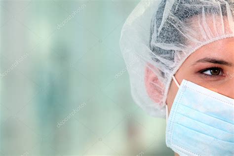 Surgeon wearing a mask — Stock Photo © photography33 #8966778