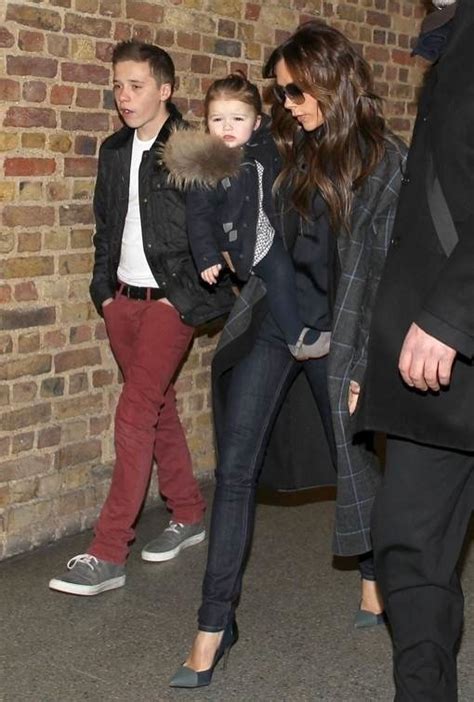 Victoria Beckham & Kids Arrive Back In London | Celeb Baby Laundry