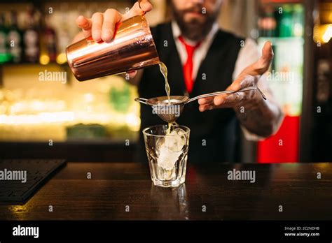 Liquor Bottles Behind Bar High Resolution Stock Photography and Images ...