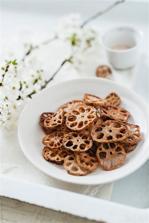 "Lotus Root Chips" by Stocksy Contributor "Tatjana Zlatkovic" - Stocksy