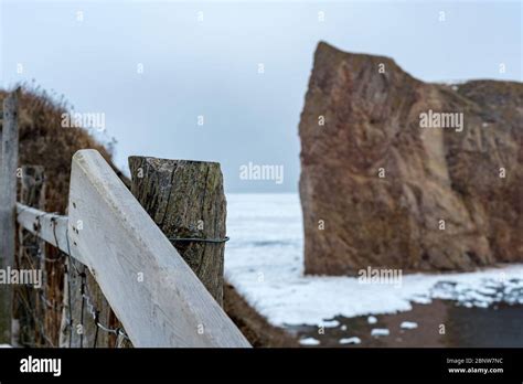 Percé Rock, a huge sheer rock formation in the Gulf of Saint Lawrence ...