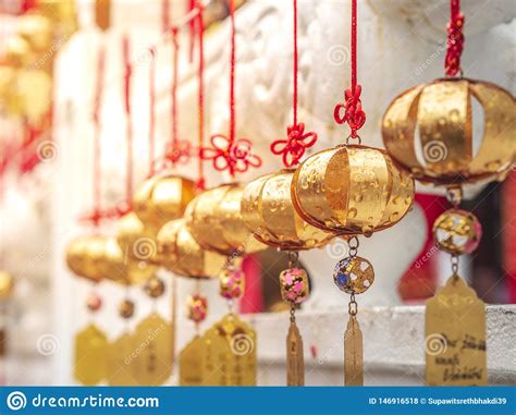 Golden Wishing Bells at Sun Moon Lake Wenwu Temple with Yellow Sunlight. Stock Photo - Image of ...