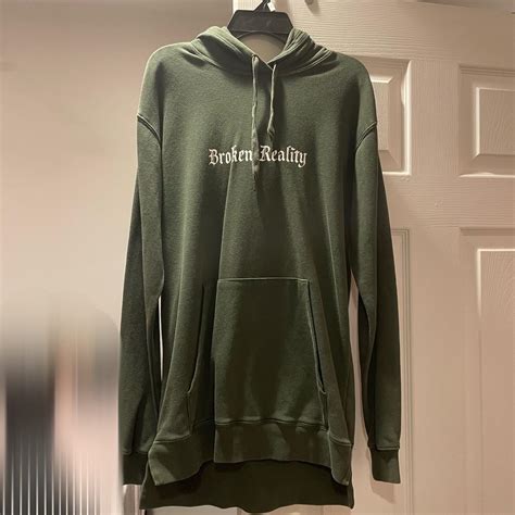 Green Graphic Hoodie ~ more like a size S or M... - Depop