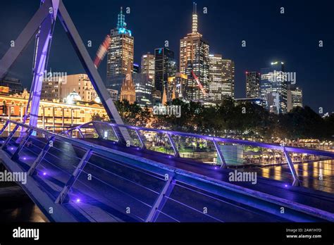 Melbourne city centre at night with evan walker pedestrian bridge and melbourne urban scene ...