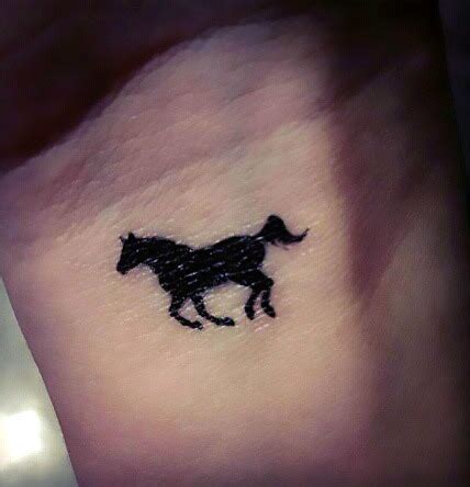 Small Horse Silhouette Tattoo Idea