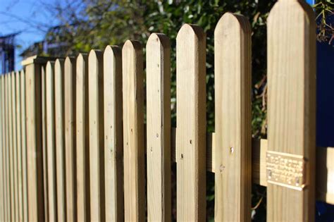 Mitre Topped Wooden Palisade Fence Panels | Jacksons Fencing