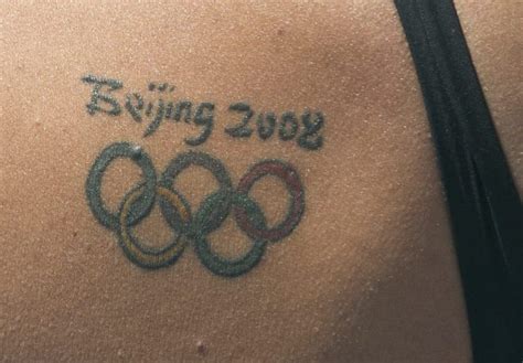 Calling All Swimmers With The Olympic Rings Tattoo