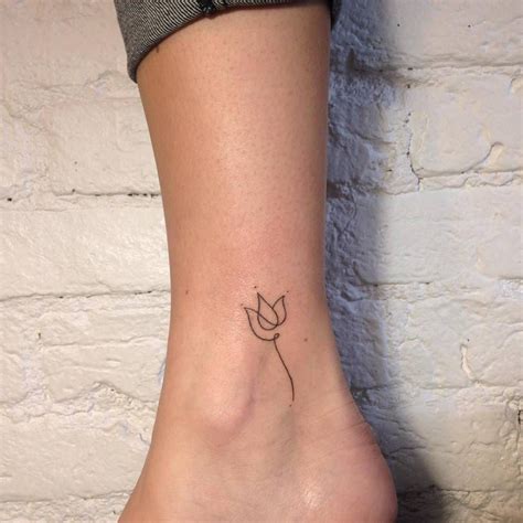 Stick and Poke Tattoo — Minimalist hand poked baby lotus flower tattoo on... | Tattoos, Trendy ...
