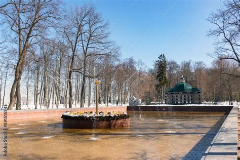 Test launch of fountains in the Peterhof palace and park complex. Snow ...