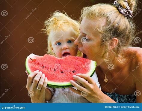 Cute Baby With A Delicious Melon Stock Photos - Image: 21242063