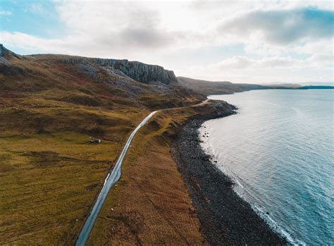 Aerial Photo of Road Near Sea Water · Free Stock Photo