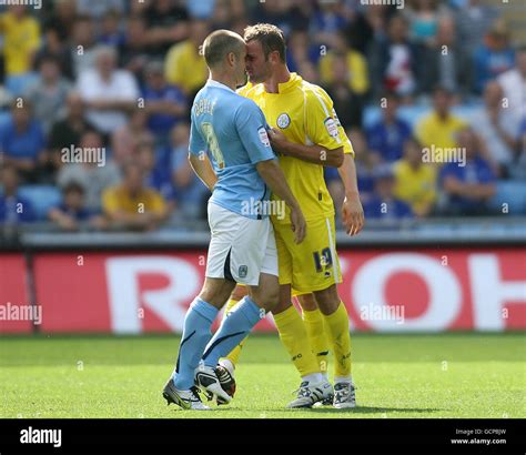 Coventry City's Michael Doyle and Leicester City's Richie Wellens have ...