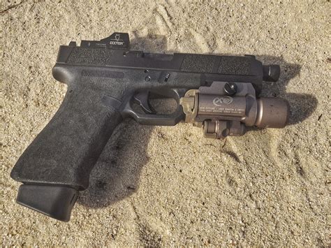 U.S. Naval Special Warfare (NSW) Adopts Glock 19 (G19) Compact Combat/Tactical 9mm Pistol for U ...