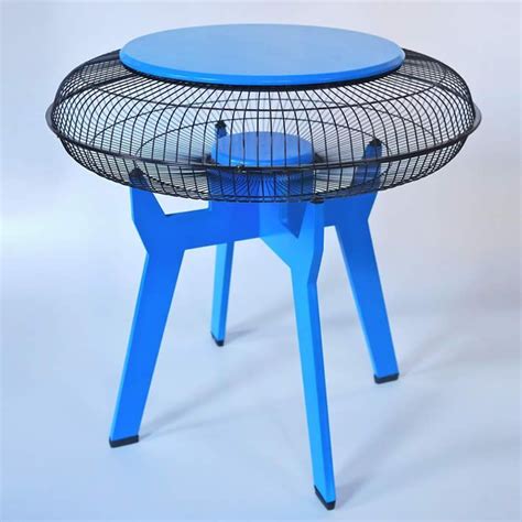 a blue table with a mesh top and legs