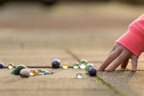 Learn How to Play Marbles in 6 Simple Steps - Plentifun