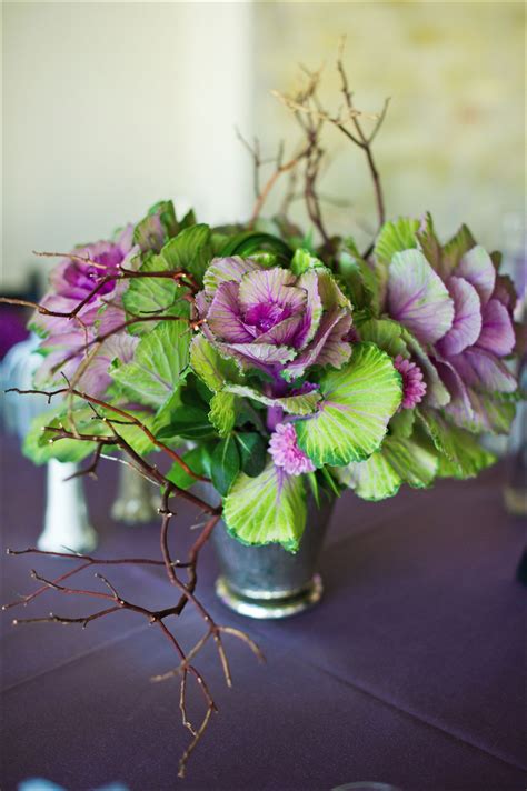 This design pairs the ruffled texture of ornamental kale with an earthy ...