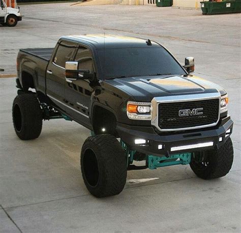 Lifted GMC Trucks: Sierra Towing Capacity and Cargo Volume | Jacked up trucks, Chevy trucks ...