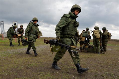 Shooting at Russian military range leaves 11 soldiers dead, 15 wounded | PBS News