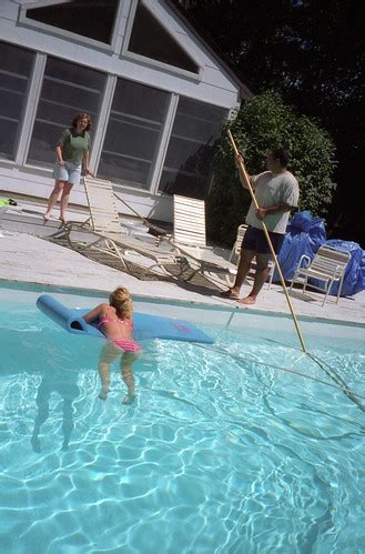 Pool Party 1997 | Vaccumming the pool before the party. | Joe Shlabotnik | Flickr