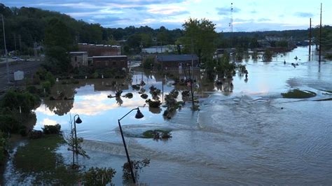 Flooding, damage, debris along French Broad River in Asheville, NC