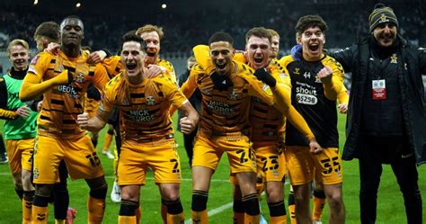 Cambridge United players celebrate after beating Newcastle in the FA ...