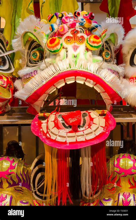 Traditional chinese lion dance head display on the shelves Stock Photo ...