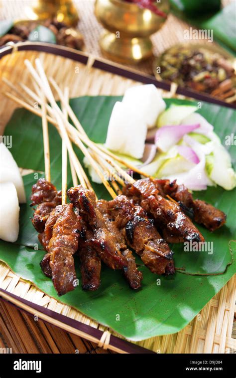 Beef satay, roasted meat skewer Asia food. Traditional Southeast Asia food. Hot and spicy ...