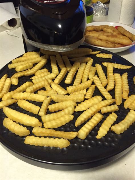 Fries came out pretty good. Got pretty crispy. It was the same time as an oven but without ...