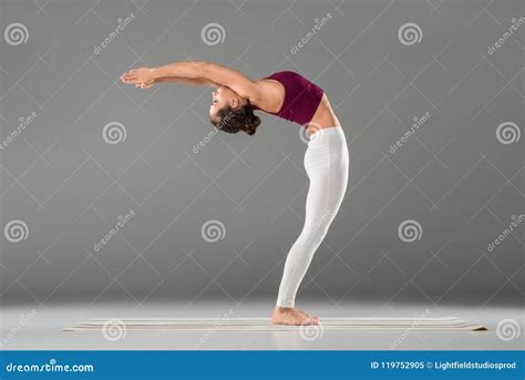 Woman Practicing Yoga, Doing Standing Backward Bend Exercise, Ardha Stock Image - Image of pose ...