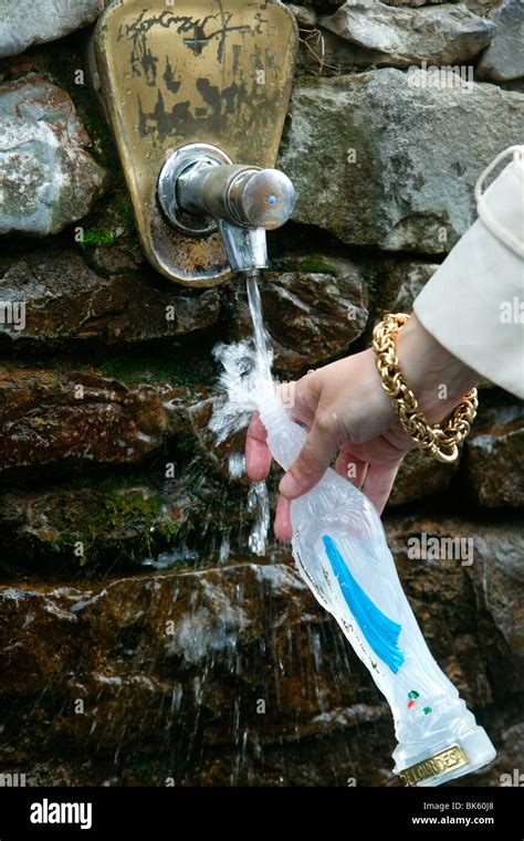 Lourdes pilgrims holy water hi-res stock photography and images - Alamy