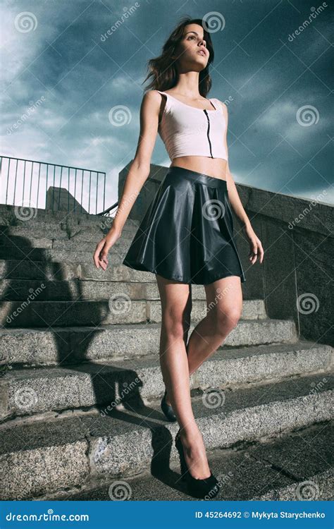 Fashion Woman Walking on Stairs Stock Photo - Image of portrait, long: 45264692