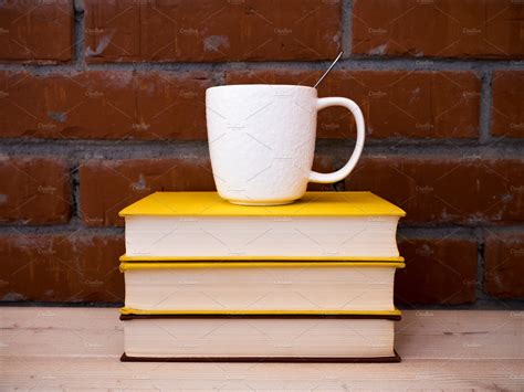 Books lying on the table featuring book, page, and table | Education Stock Photos ~ Creative Market