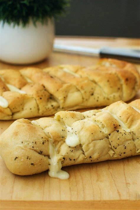 Cheesy garlic baguettes | Garlic baguettes, Recipes, Food