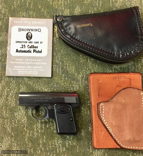 Baby Browning 25 Auto w/ original manual, Browning pouch, and a Safariland wallet holster