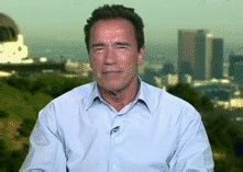 Arnold Schwarzenegger Listening Then Laughing | Gifrific