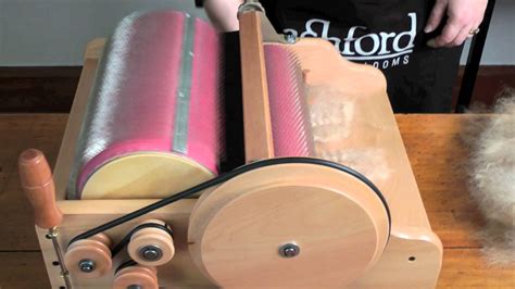 Carding fleece on an Ashford Drum Carder | Spinning wool, Spinning yarn ...