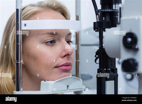 Eye examination on slit lamp Stock Photo - Alamy