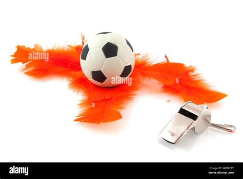 Dutch soccer with whistle and ball on orange Stock Photo - Alamy