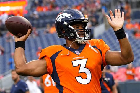 Russell Wilson Era begins for Denver Broncos back in Seattle | AP News