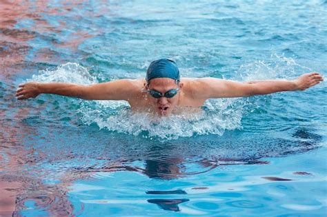 Premium Photo | Portrait of a swimmer breathing performing the ...