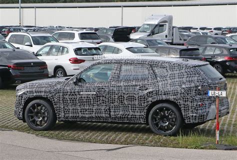 2022 BMW X8 / X8 M Spied in Detail, Hybrid Hides Strange Exhaust - autoevolution