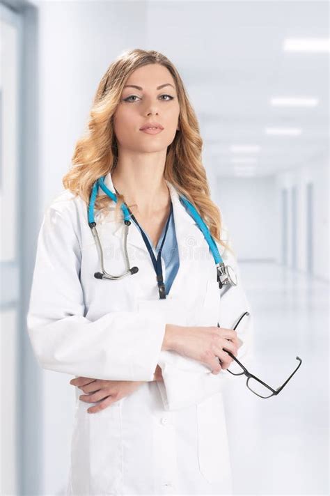 Female Doctor in White Surgical Coat Stock Image - Image of coat, caucasian: 102422333