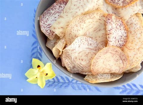 Hawaiian Taro chips inside a bowl Stock Photo - Alamy