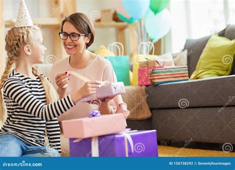 Opening Birthday Gifts with Mom Stock Photo - Image of childhood, home ...