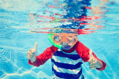 cute little boy swimming underwater 788271 Stock Photo at Vecteezy