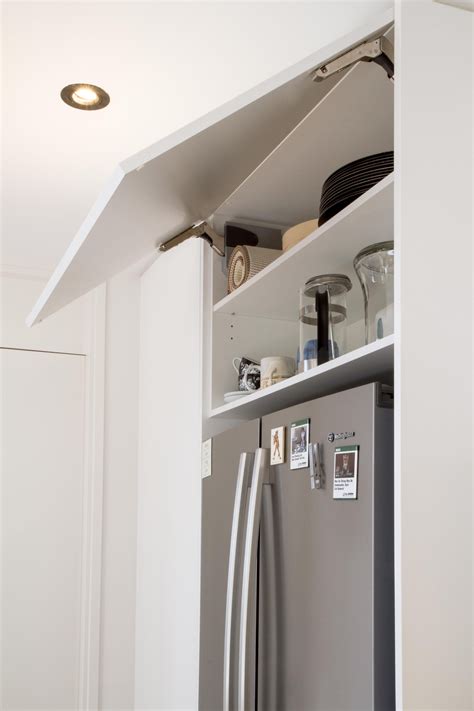 Overhead cabinet www.thekitchendesigncentre.com.au | Overhead storage, Storage cabinets, Kitchen ...