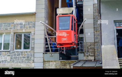 TATRANSKA LOMNICA, SLOVAKIA - August 23, 2022: Red cable car going to ...