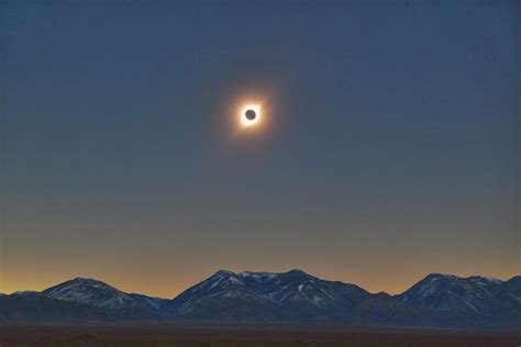 A Black Hole Sun, somewhere near The Andes in Argentina [OC][4896x3264 ...